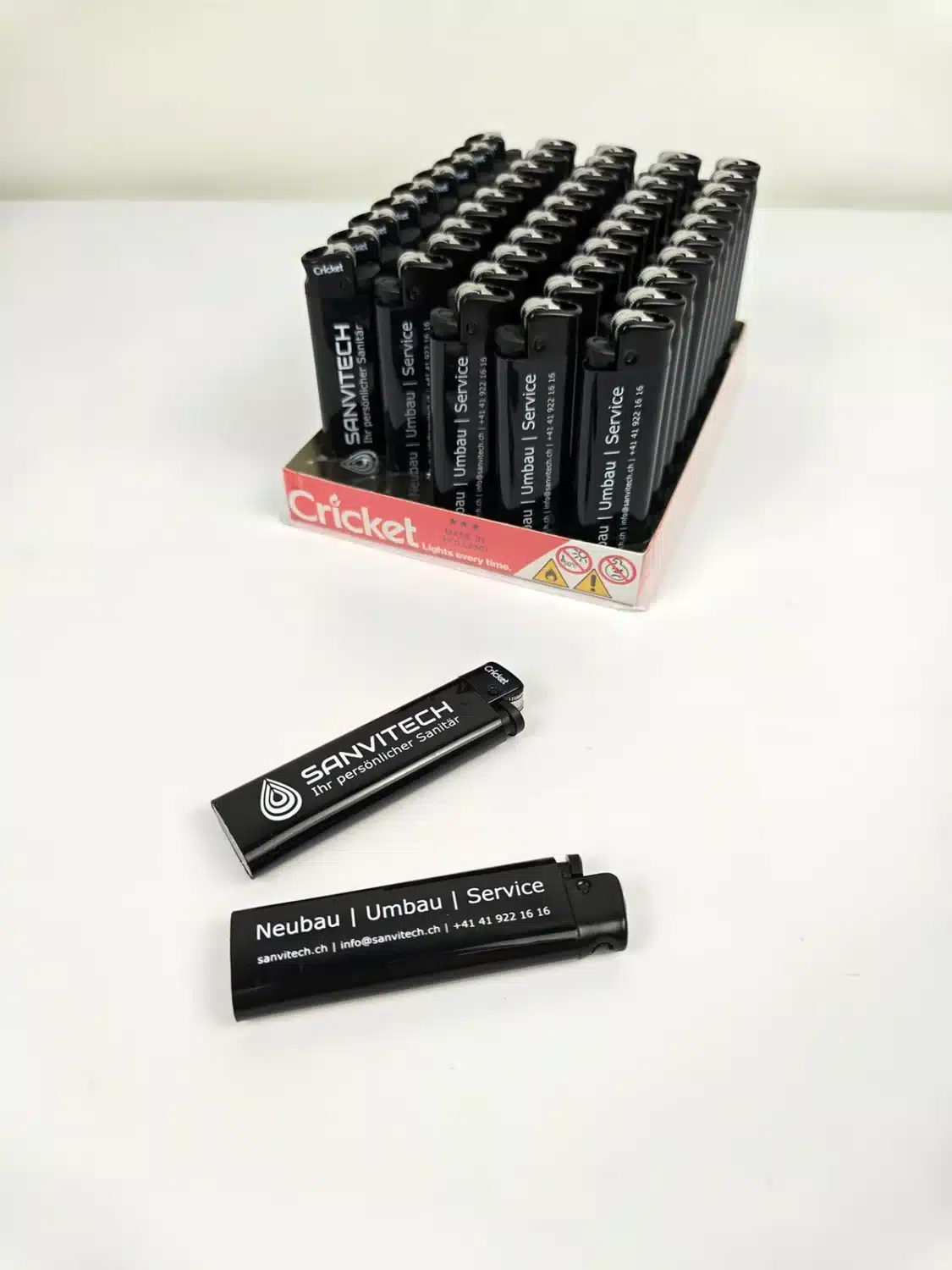 Black Cricket Original lighter with the Sanvitech logo